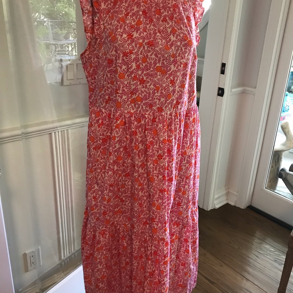 J. Crew dress in bright hues of pink & orange. Side zipper and button hole back.
